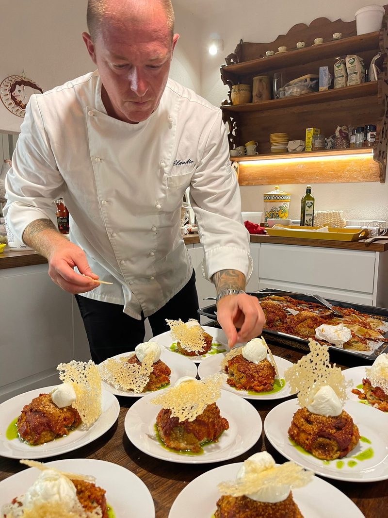 Private chef preparing Sardinian cuisine in villa